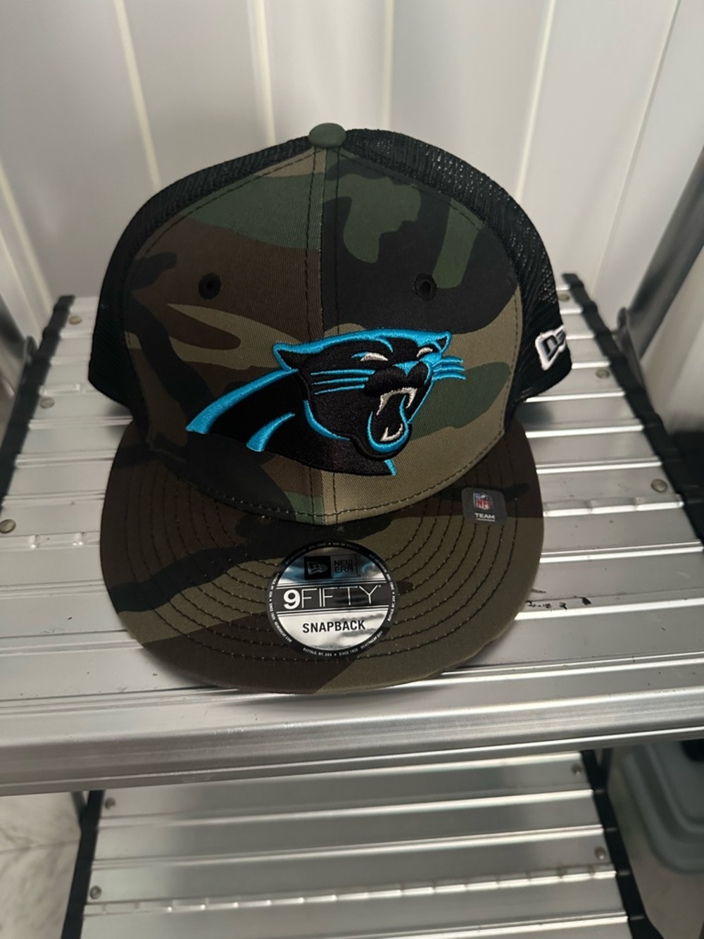 New Era Camouflage Carolina Panthers Snapback Hat with Teal Logo